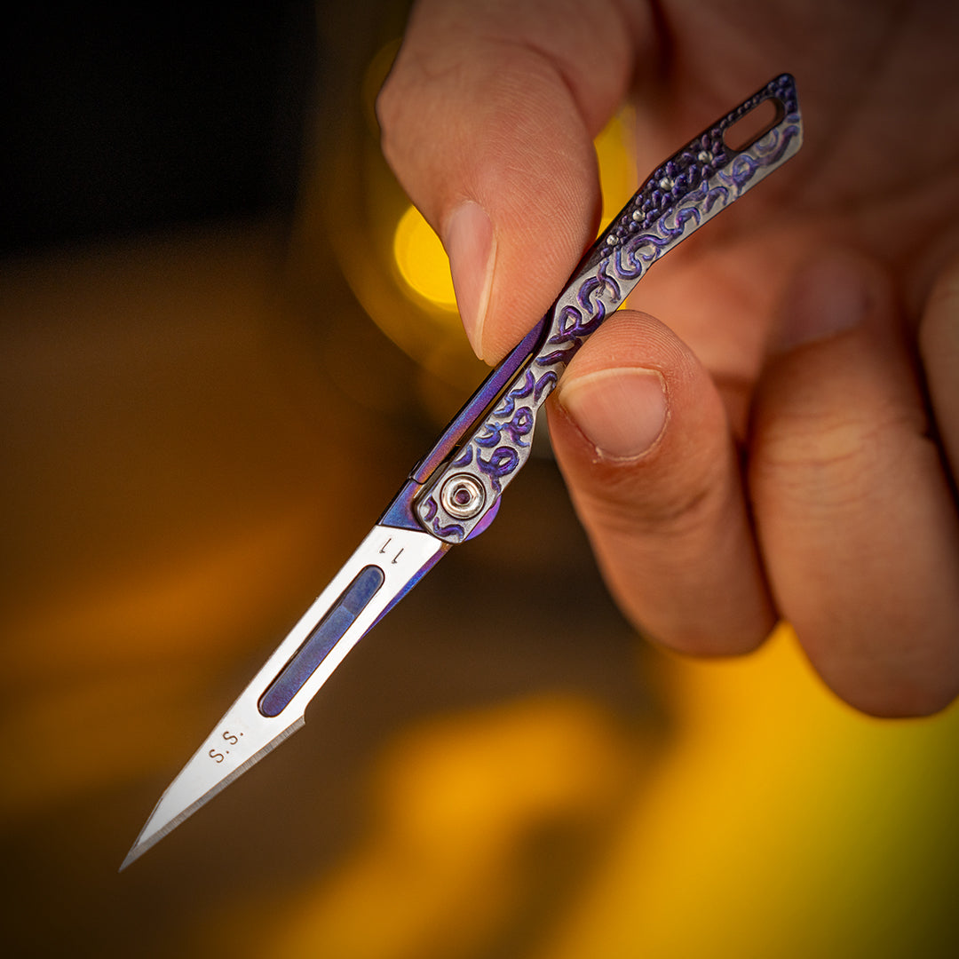 Falcon 1.0 Micro Cutter: Titanium Utility Mini Folding Cutter