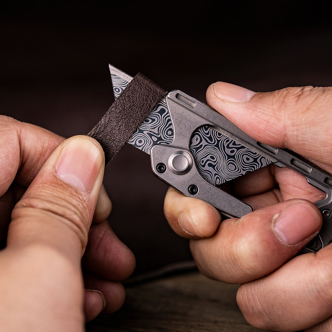 Cuchillo portátil múltiple de seguridad de titanio