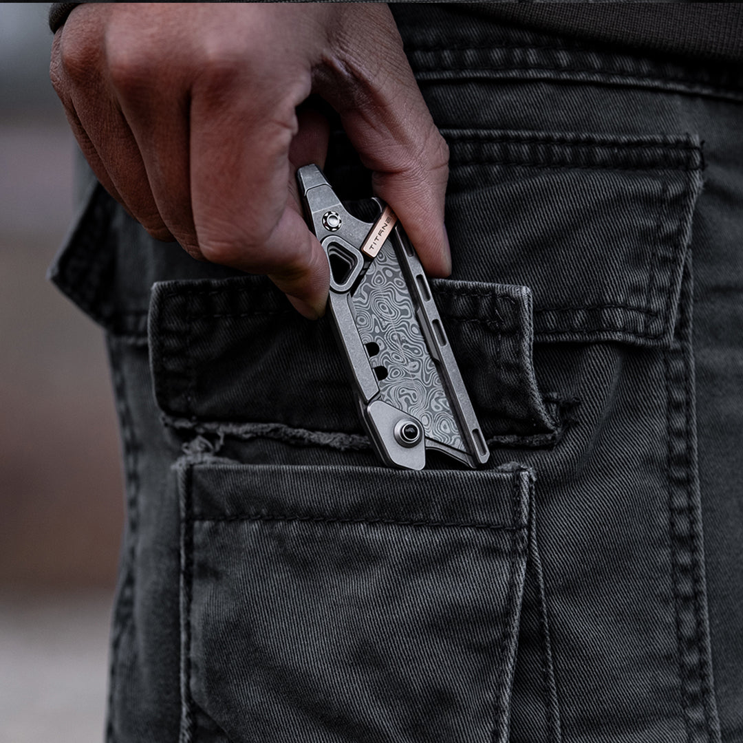 Cuchillo portátil múltiple de seguridad de titanio