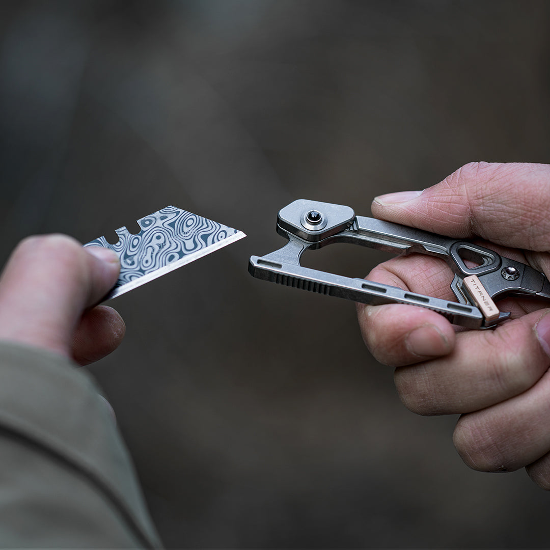 Cuchillo portátil múltiple de seguridad de titanio