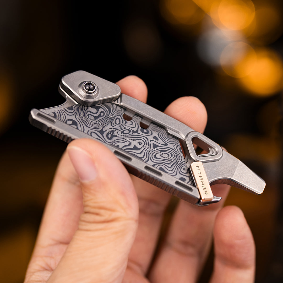 Cuchillo portátil múltiple de seguridad de titanio