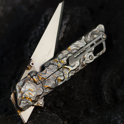 Hand-carved Raven: Titanium Utility Folding knife