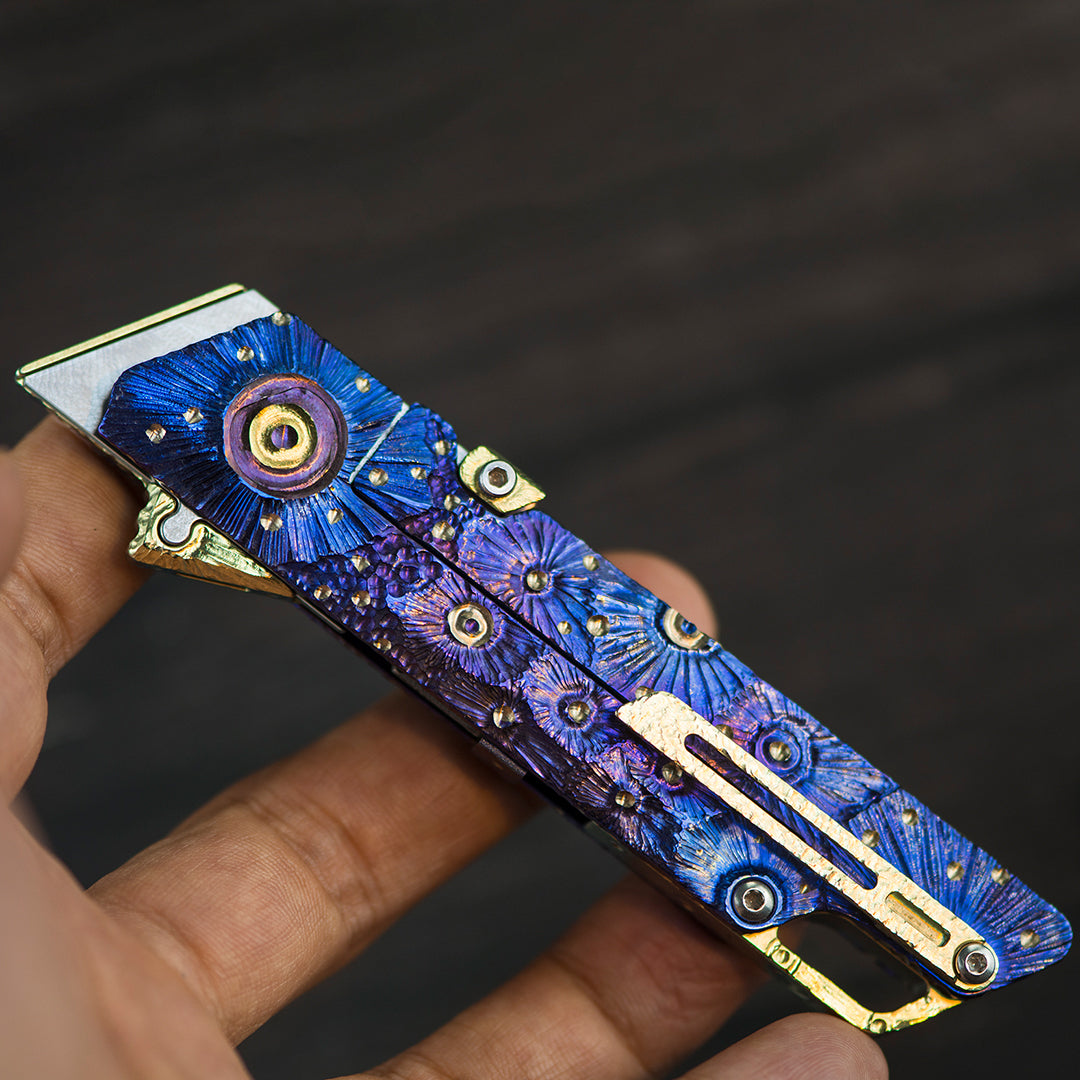 Hand-carved Raven: Titanium Utility Folding knife