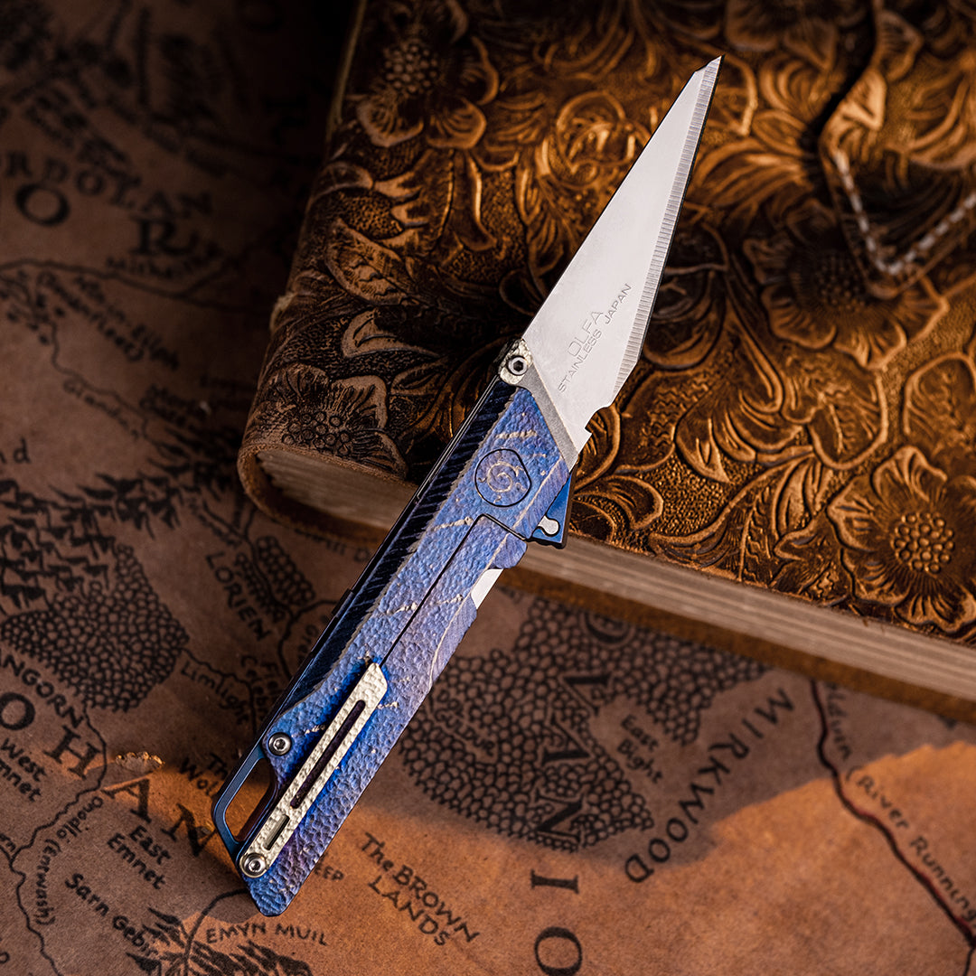 Navaja plegable multiusos de titanio Blue Meteor Raven 