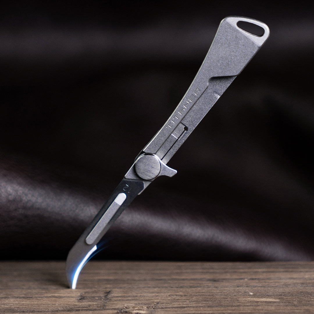 Tiflex: a Mini Titanium Folding Knife of Super Sharpness