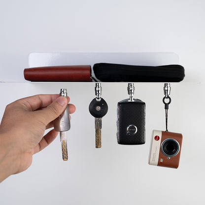 Tinexus: Quick-Release EDC Carry System