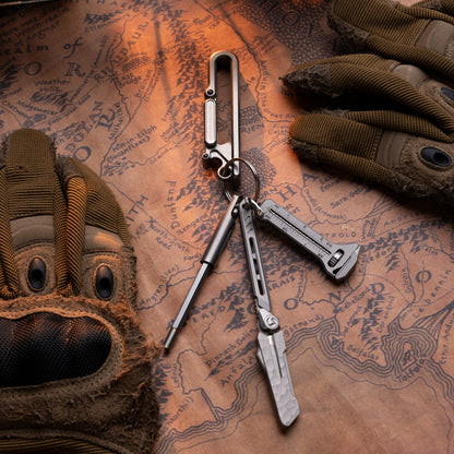 Llave utilitaria de titanio con cuchillo